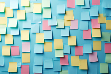 Colorful Sticky Notes on a Blue Background
An assortment of multicolored post-it notes arranged in a random pattern on a bright blue background.
