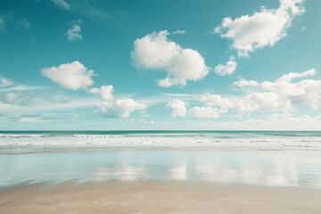 Fototapeta na wymiar Calm Seashore with Puffy Clouds and Reflective Sand 