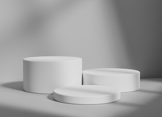 White cylinder podium with white background for product display with shadows and light