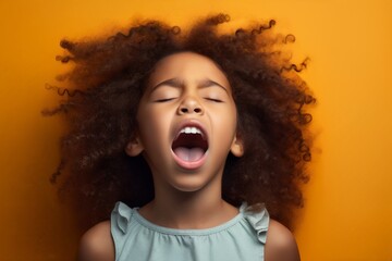 extremely whim Upset black curly haired young girl screaming and crying with opened mouth and closed eyes against color wall - obrazy, fototapety, plakaty