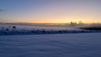 winter morning in a village field