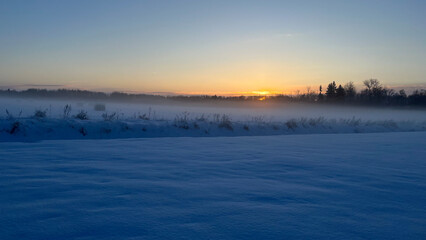 winter morning in a village field