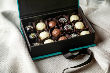Assorted Chocolates Box on Bed