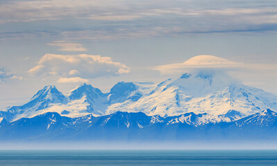 Fototapeta na wymiar Across the Cook Inlet - Mt. Iliamna from the Sterling Hiway