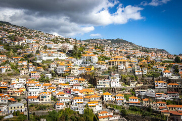 Fototapeta na wymiar panoramic view over funchal and monte from cable car, aerial view, madeira, portugal, sea, mountains