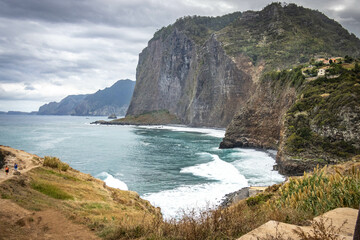 Fototapeta na wymiar miradouro do guindaste, madeira, viewpoint, ocean, cliffs, mountains, waves, portugal