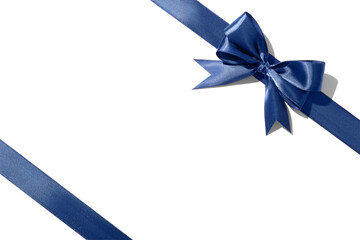 Blue silk ribbon on a white background. Isolated. Top view. Space for text.