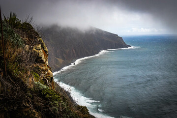 Fototapeta na wymiar cliffs of Ponta do Pargo, most western point of madeira, island, volcanic, atlantic ocean, portugal, europe, cloudy