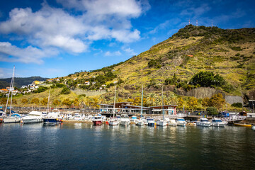 Fototapeta na wymiar harbour of Machico town, madeira, island, volcanic, mountains, portugal, europe
