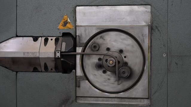 CNC bending machine bends steel wire. Formation of a bent part. Wire bending machine.  Close up of CNC wire bending machine
