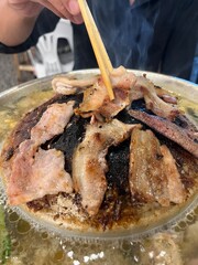 Grilled pork on a charcoal grill,Thai food