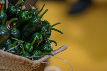 hot green peppers in a basket