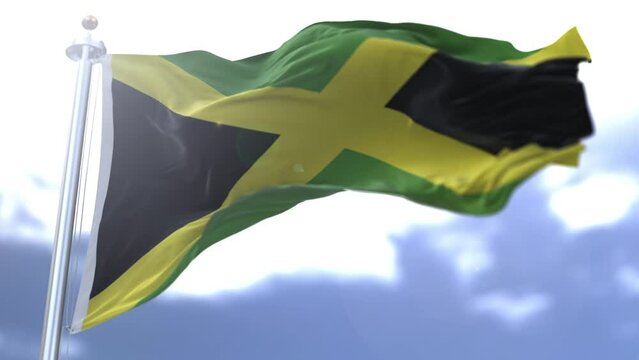 Jamaica flag waving against the sky. High quality 4k footage