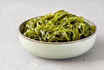 Fresh Seaweed Salad in Ceramic Bowl © TATIANA Z