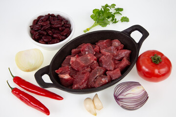 raw meat with vegetables