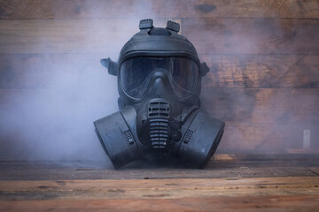 Black gas mask and smoke 