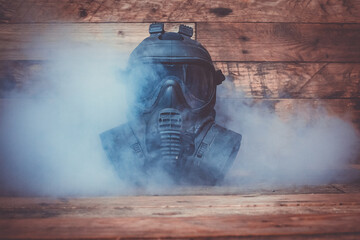 Black gas mask and smoke  - obrazy, fototapety, plakaty
