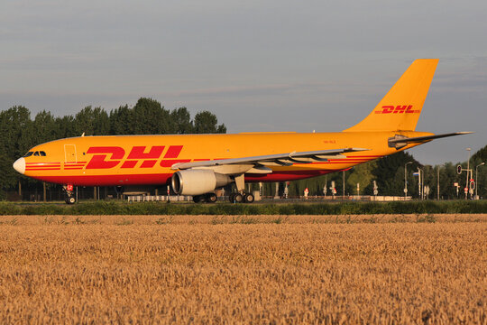 Hoofddorp, Netherlands - August 2, 2008: DHL Aviation Airbus A300F with registration OO-DLZ rolling on taxiway V of Amsterdam Airport Schiphol