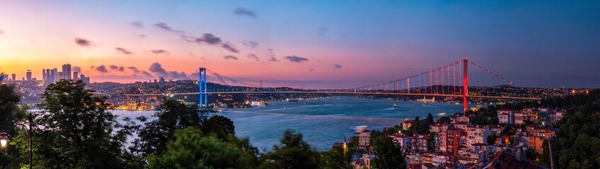 Istanbul Bosphorus panoramic photo. Istanbul landscape beautiful sunset with clouds Ortakoy Mosque, Bosphorus Bridge, Fatih Sultan Mehmet Bridge Istanbul Turkey.Best touristic destination of Istanbul - obrazy, fototapety, plakaty