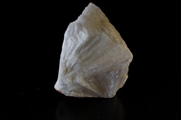 Mesolithic stone mineral on dark background.
