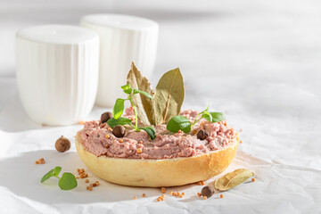 Tasty and fresh sandwich with pate, herbs and spices.