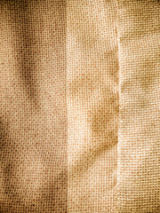old khadi fabric texture background. light natural linen texture for the background.Golden yellow linen fabric of table cloth texture background.