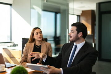 Businesspeople sharing some ideas in a meeting room