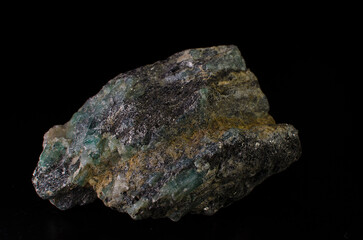 Hematite stone mineral on black background.