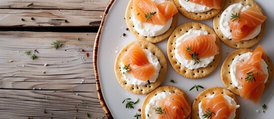 Grilled salmon served with rice and a medley of lemon, onion, and tomato.