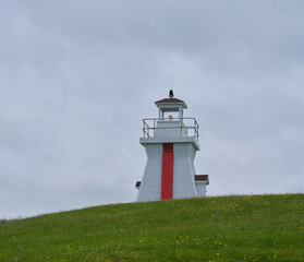 The Canadian Red and white Balache Point Lighthouse on Nova Scotia which replaced the old lighthouse - 727395942