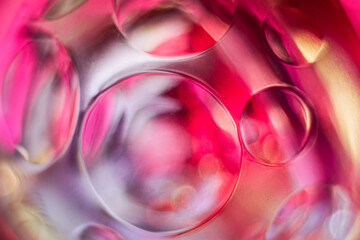 Abstract pink and red glass orbs