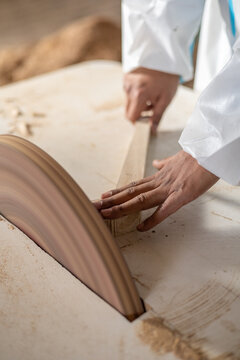 carpentry interior working with machines, sander and wood, occupation detail