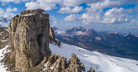 Successful group of climbers on top of magnificent mystical mountains