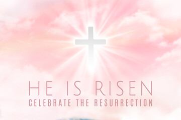 Easter illustration with the text 'He is Risen' and a shining cross on blue sky with lightbeam.