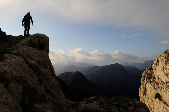dangerous and cliff high mountain climber