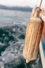 Superyacht hull reflections. close-up shot of passenger boat going in the sea