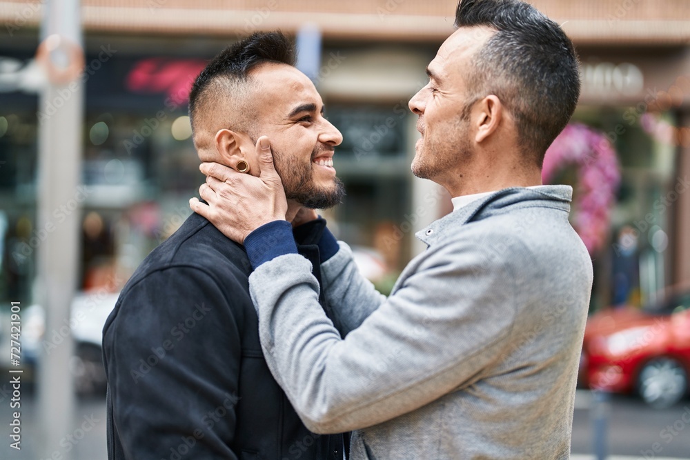 Poster Two men couple smiling confident hugging each other at street