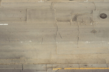 Dirty and worn textured road for graphics and urban gritty feel