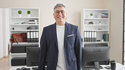 Young caucasian man business worker smiling confident at the office