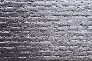 Texture of a black brick wall