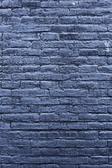 Texture of a black brick wall