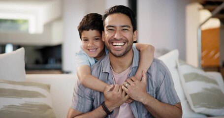Face, father and son hug for support in home for care, safety or bonding together to relax on sofa. Smile, love or happy single parent dad with fun kid for security, joy or boy child in family house