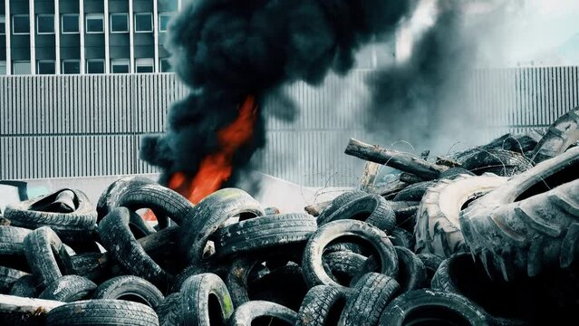 Pile of burning tyres during street riots