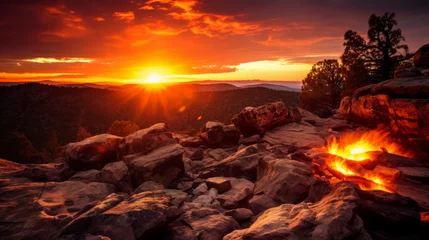 Foto op Canvas The Sun Sets Over a Rocky Mountain Range © Pavlo