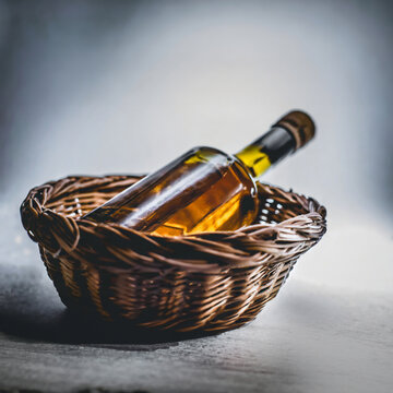 Bottle of whiskey in basket