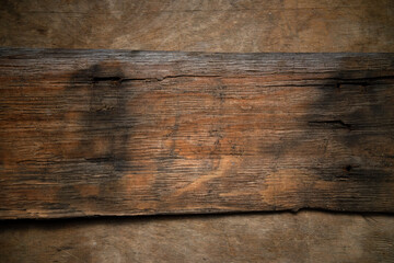 A photo of the texture of old wood. A wooden piece from an ancient ship.