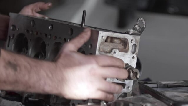 Mechanic Repairing Cylinder Block of Car Engine Footage.