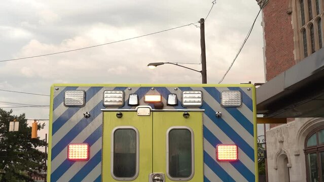 EMS EMT Ambulance ambulance vehicle with flashing lights and sirens