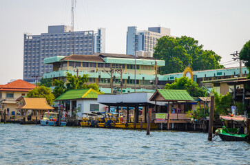 Traditional Thai houses on the water in Bangkok, Thailand