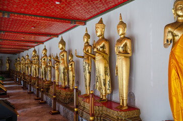 Row Of Buddha statue in beautiful Wat Pho Temple of Reclining Buddha in Bangkok, Thailand